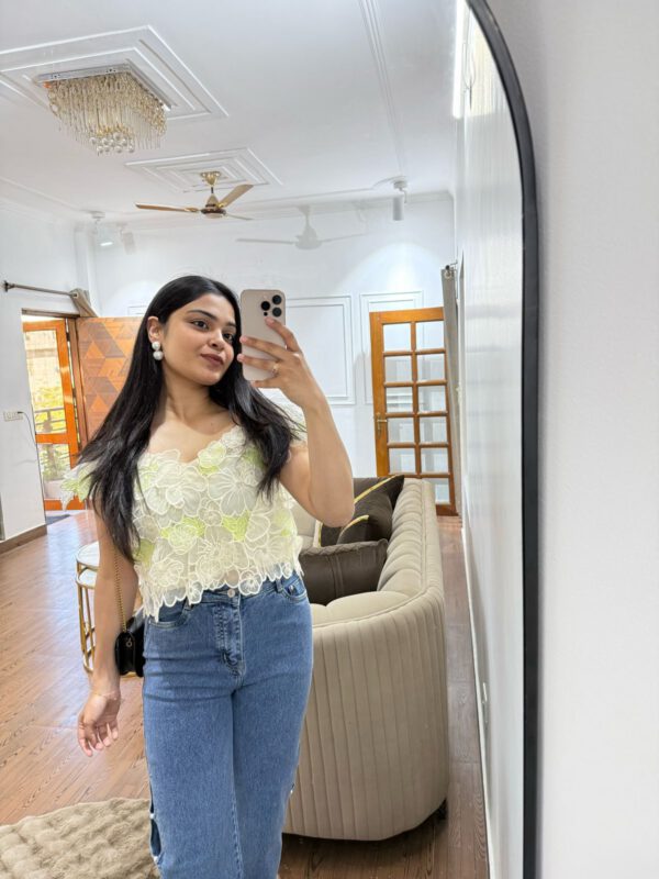 Floral appliqué top